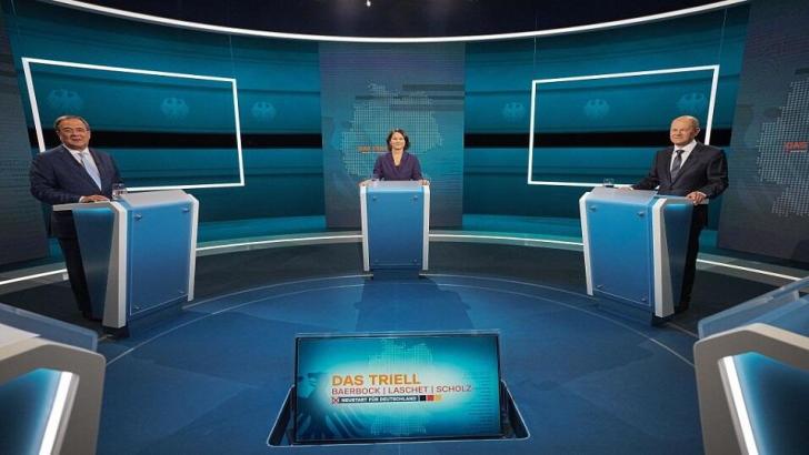 German election candidates Laschet, Baerbock and Scholz clash in a live TV debate